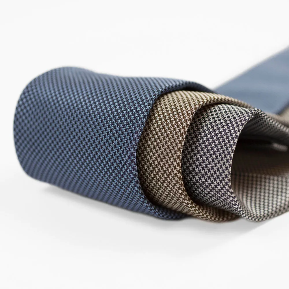 Self-tipped silk tie, black and blue houndstooth jacquard