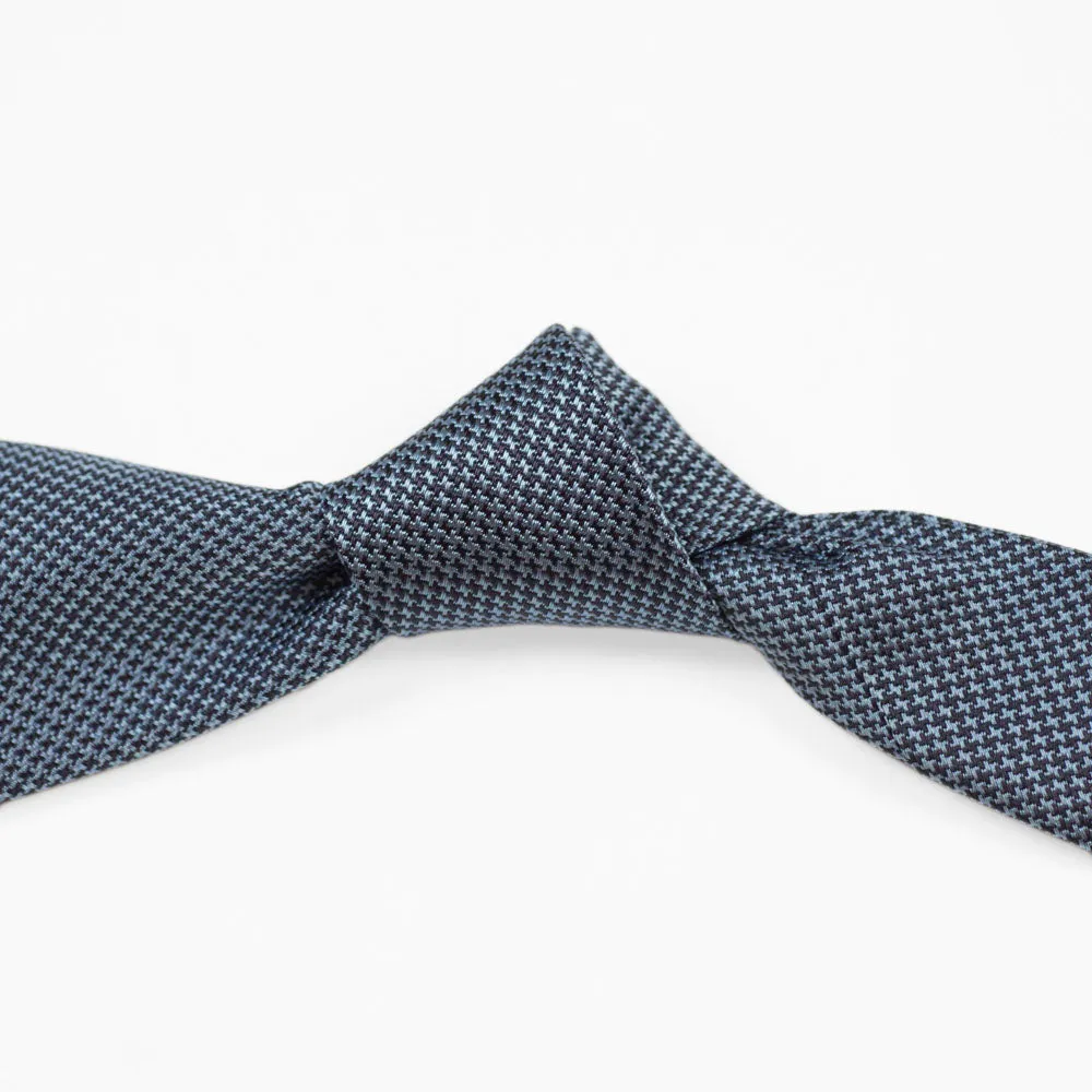 Self-tipped silk tie, black and blue houndstooth jacquard