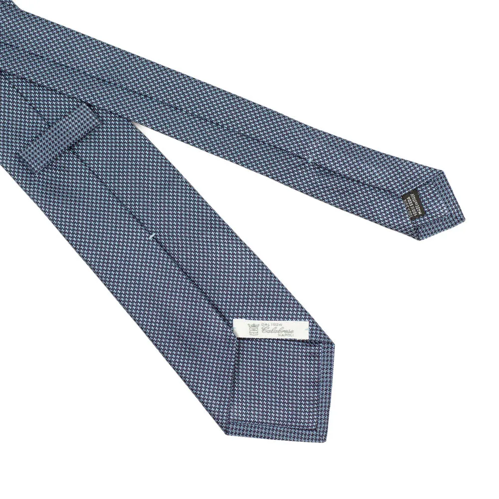 Self-tipped silk tie, black and blue houndstooth jacquard